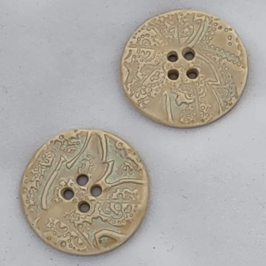 stylized leaf texture cream with mint highlights round buttons by flicker bug