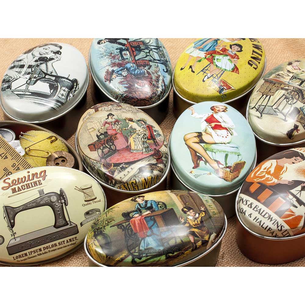 Collection of vintage-style tin boxes with different designs on a wooden surface