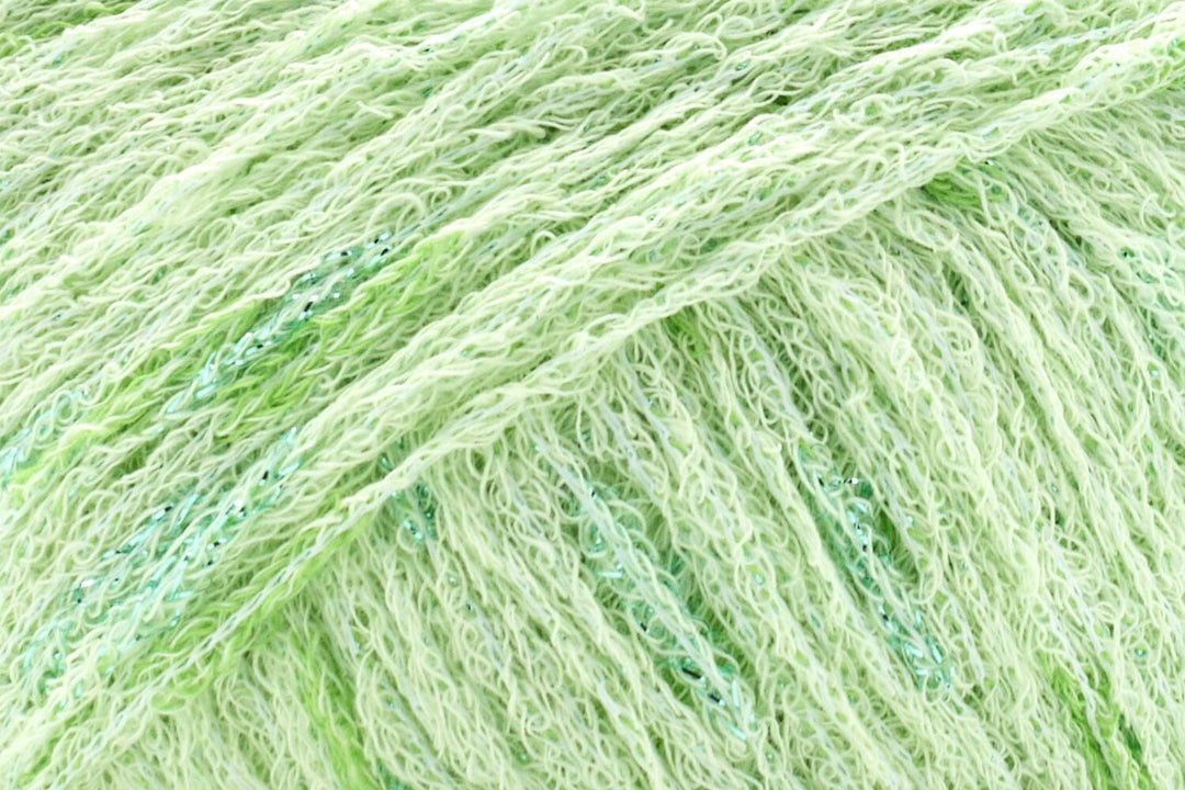Close-up of light green yarn strands