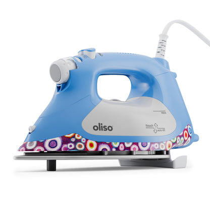 Blue and gray Oliso iron with colorful base on a white background