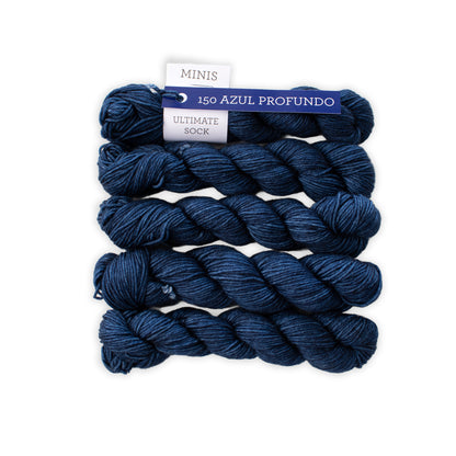 Blue yarn skeins with a label on a white background