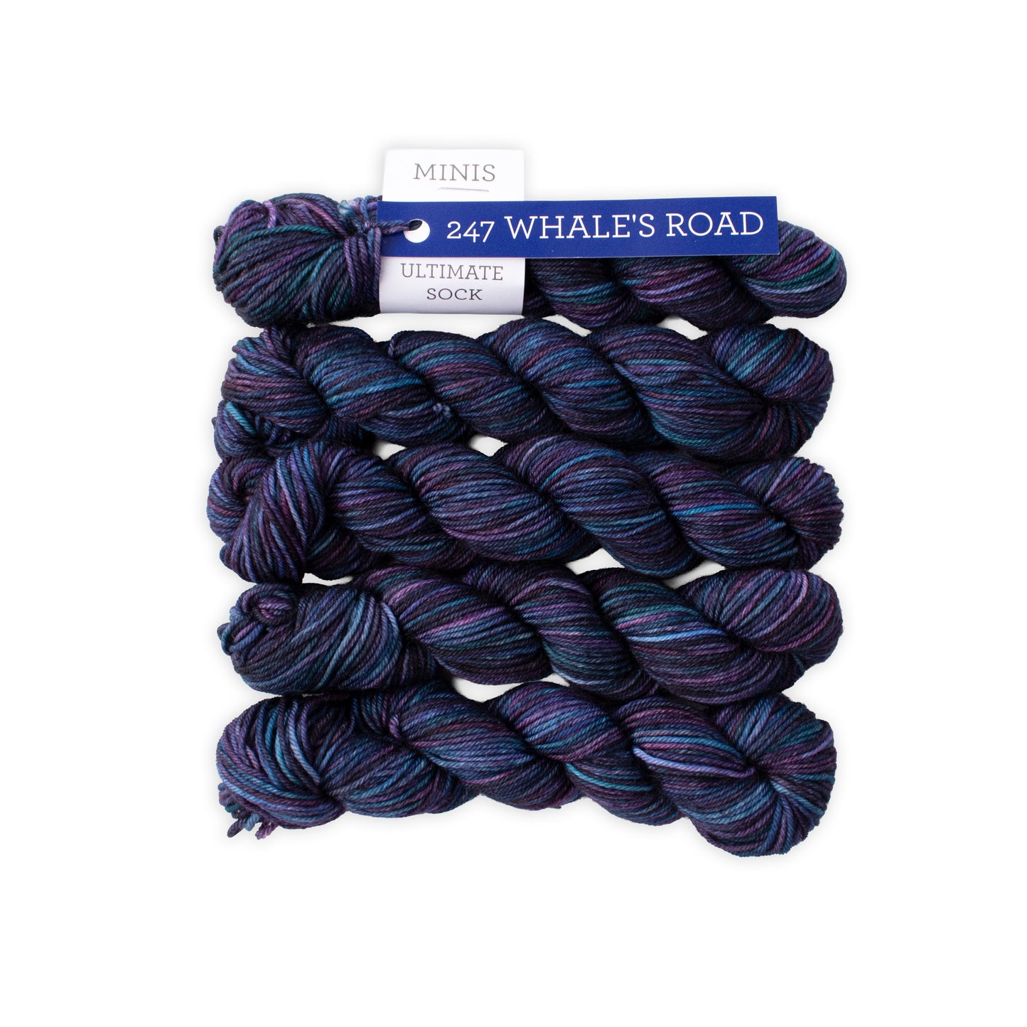 Three skeins of blue and purple yarn with a label on a white background