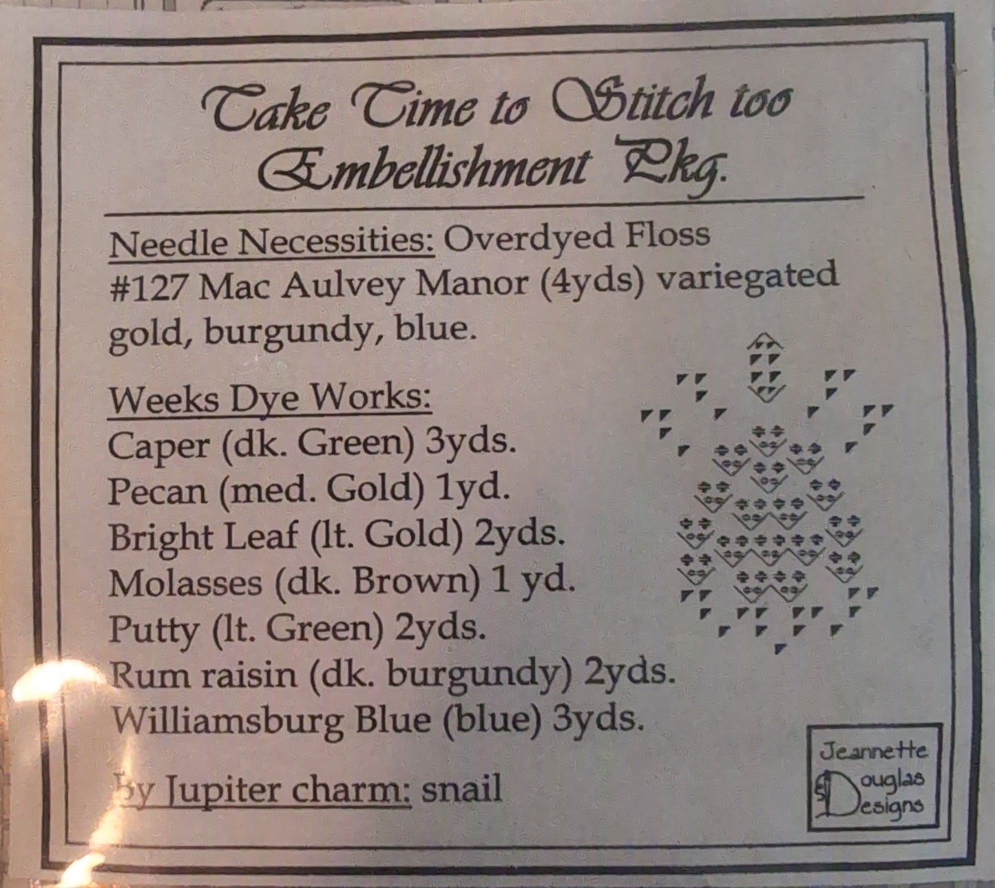 Embroidery pattern with text and design on a clear background