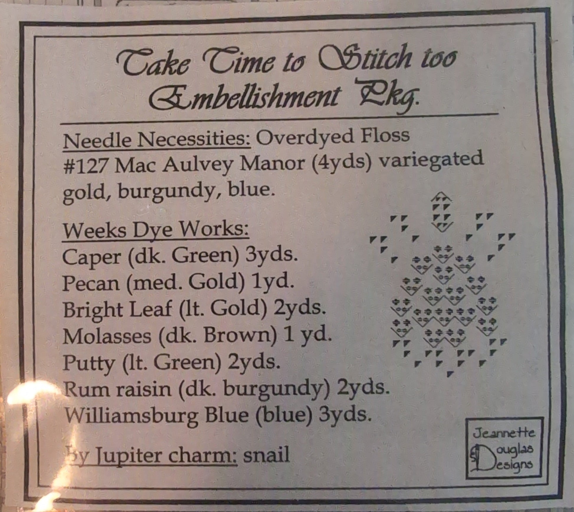 Embroidery pattern with text and design on a clear background